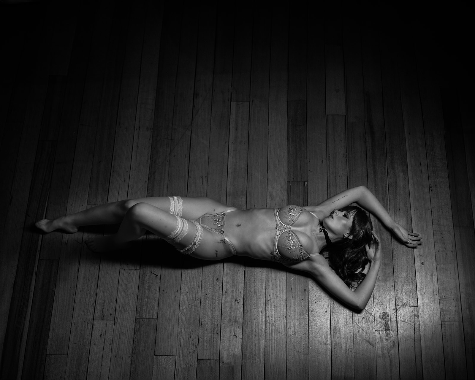 Nikki — black and white floor portrait