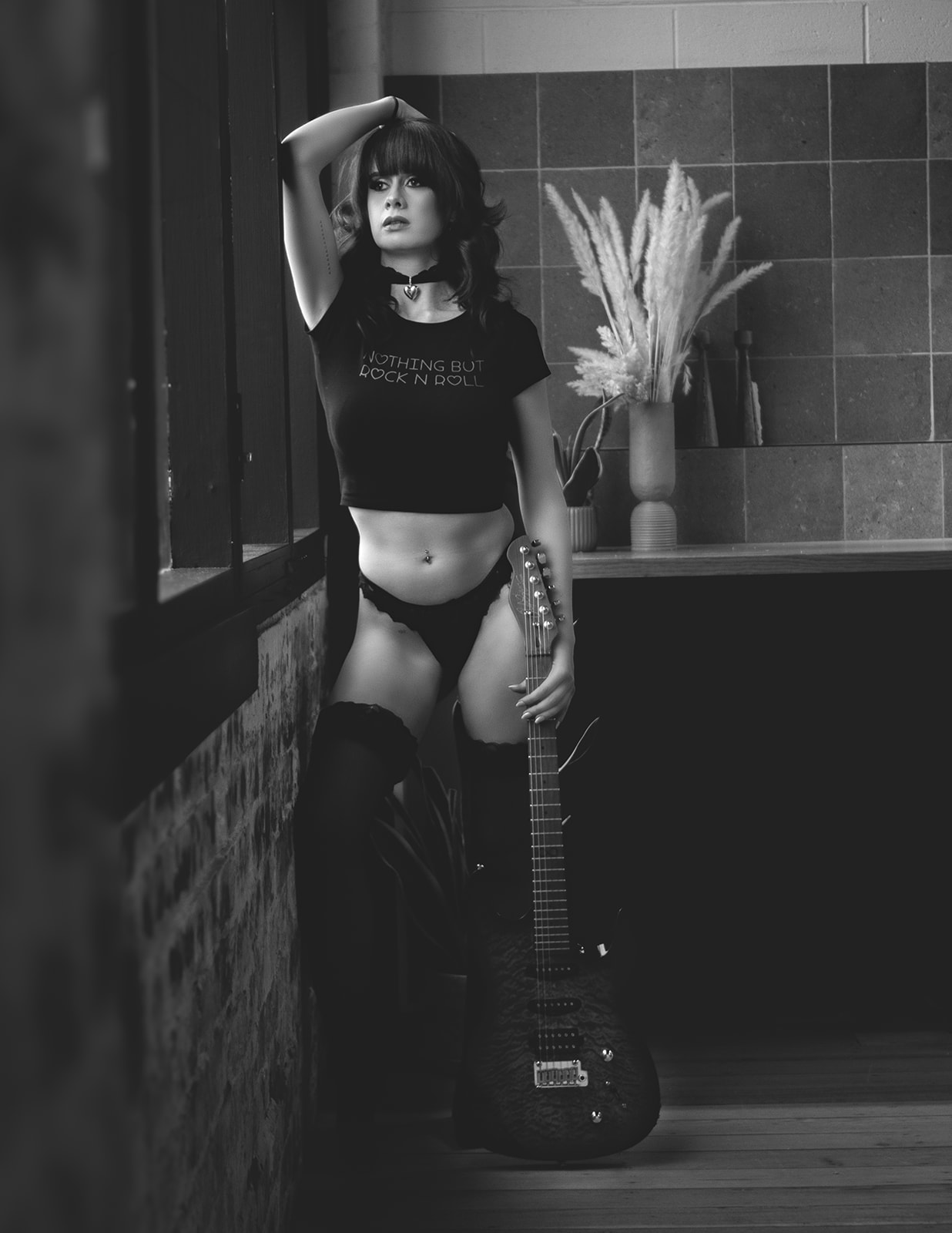 Nikki — standing boudoir portrait with guitar
