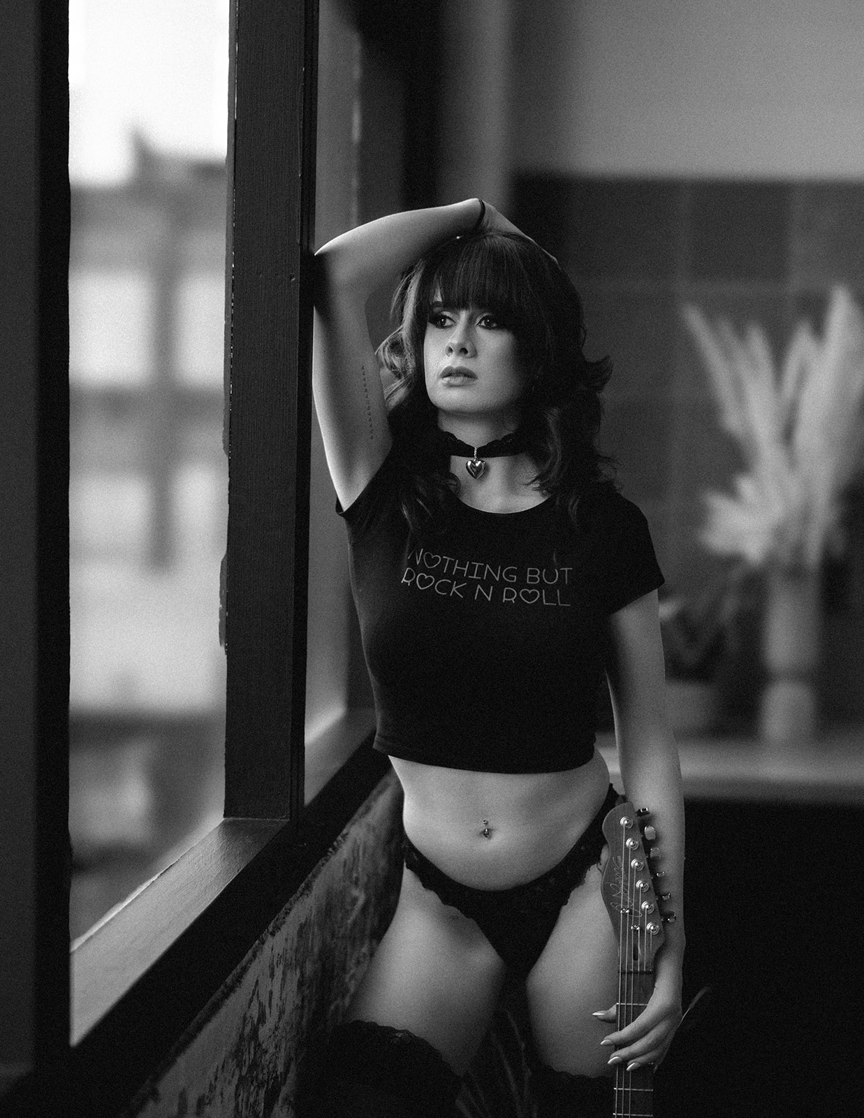 Nikki — artistic portrait with guitar, natural light